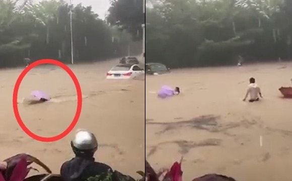 廈門女子暴雨中被洪水淹沒沖走 危急時(shí)刻的哥飛身救人現(xiàn)場(chǎng)