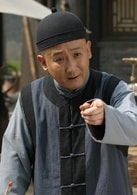 梁天