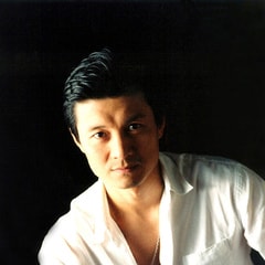 任偉?