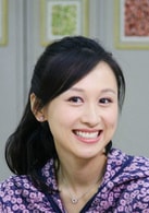 練束梅