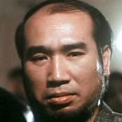 譚偉民