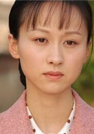 練束梅
