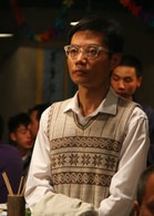 何強