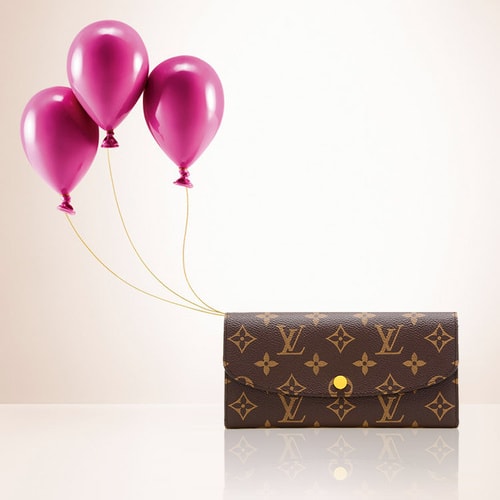 Louis Vuitton/路易威登 老花按扣長(zhǎng)款女士錢包Emilie帆布 新款招財(cái)黃色